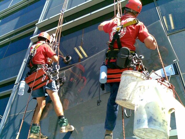 1_window_glazing_and_tinting_window_replacement_via_rope_access_on_a_multi_story_commercial_building_in_sydney (Demo)